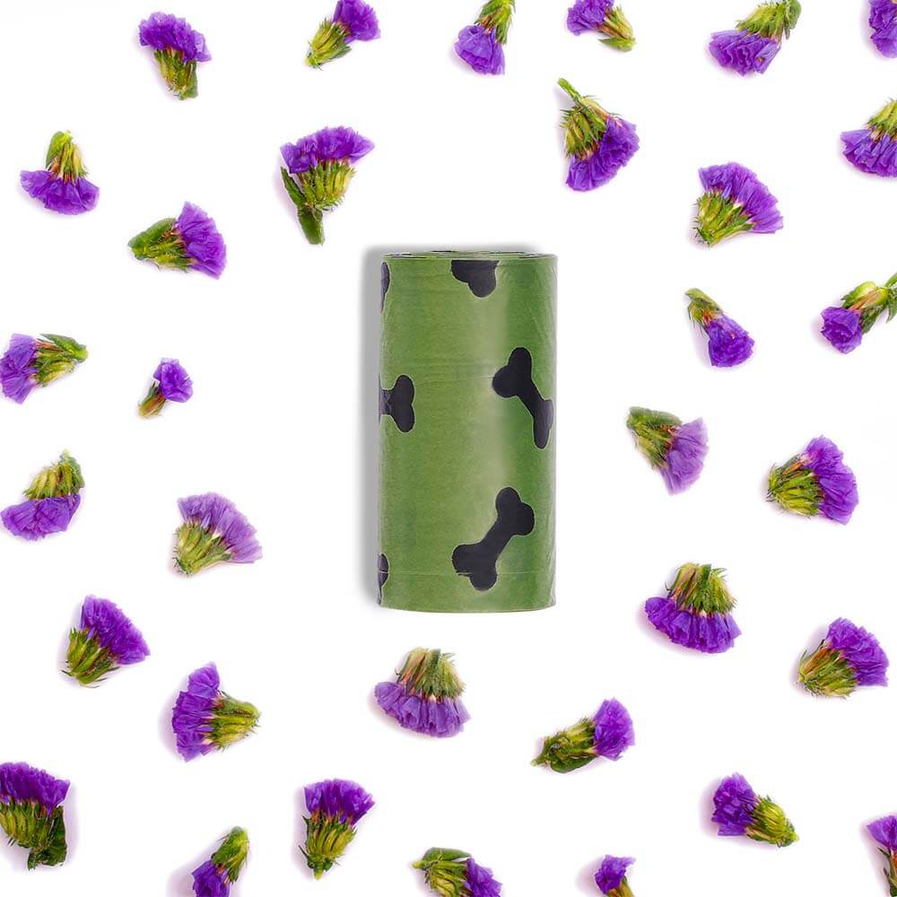 Lavender-scented biodegradable dog waste bags rolled up in dispenser