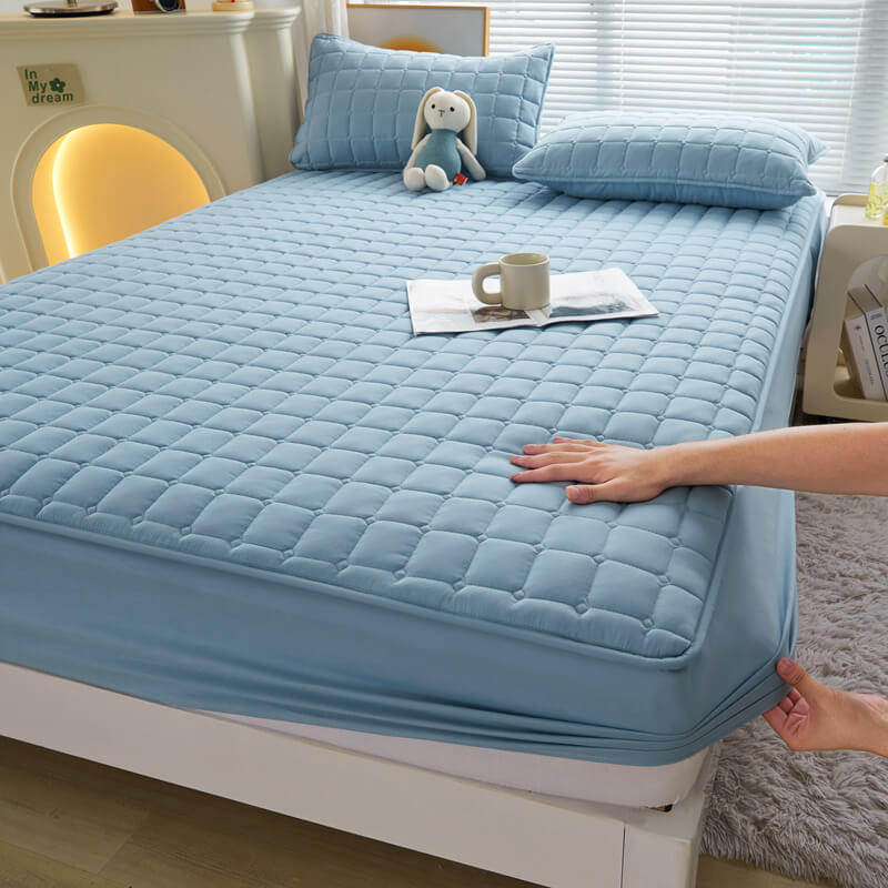 Close-up of the EverDry Ultimate waterproof mattress protector fabric, showcasing its soft texture and quilted pattern for comfort.