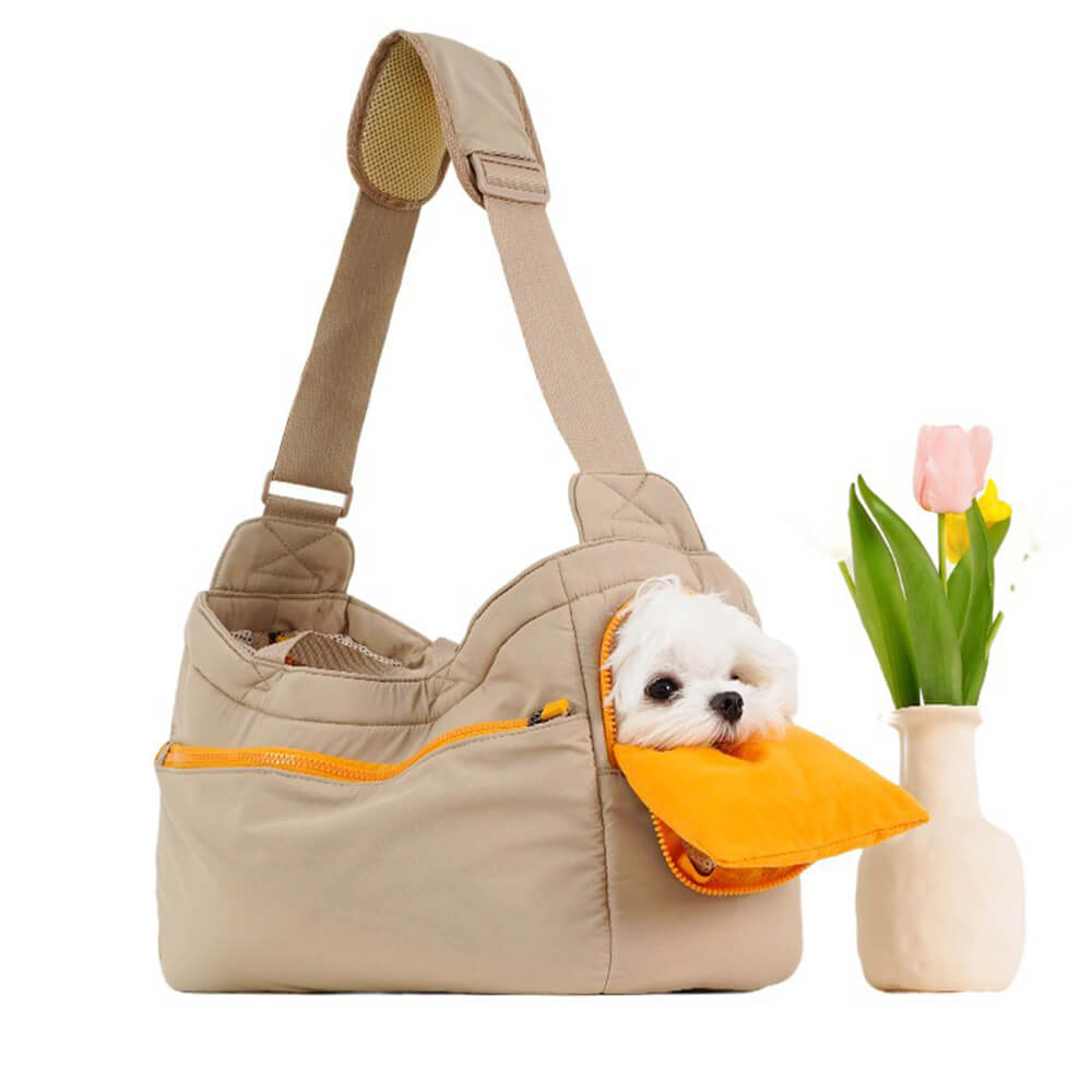ComfortCruiser Large Soft Pet Carrier in a stylish setting, showing off its ergonomic handles.