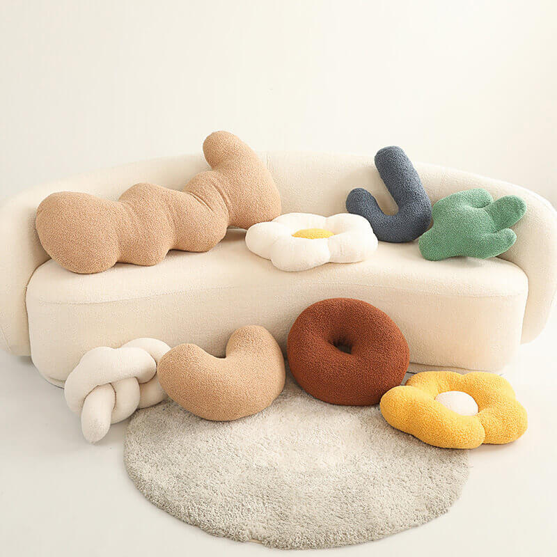 Twist sofa pillow displayed on a modern couch, enhancing living room decor.