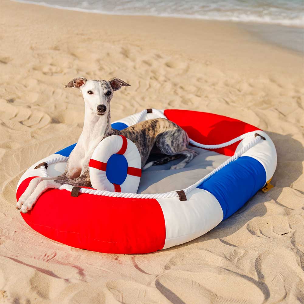 Waterproof boat-shaped pet bed for dogs in blue and white design