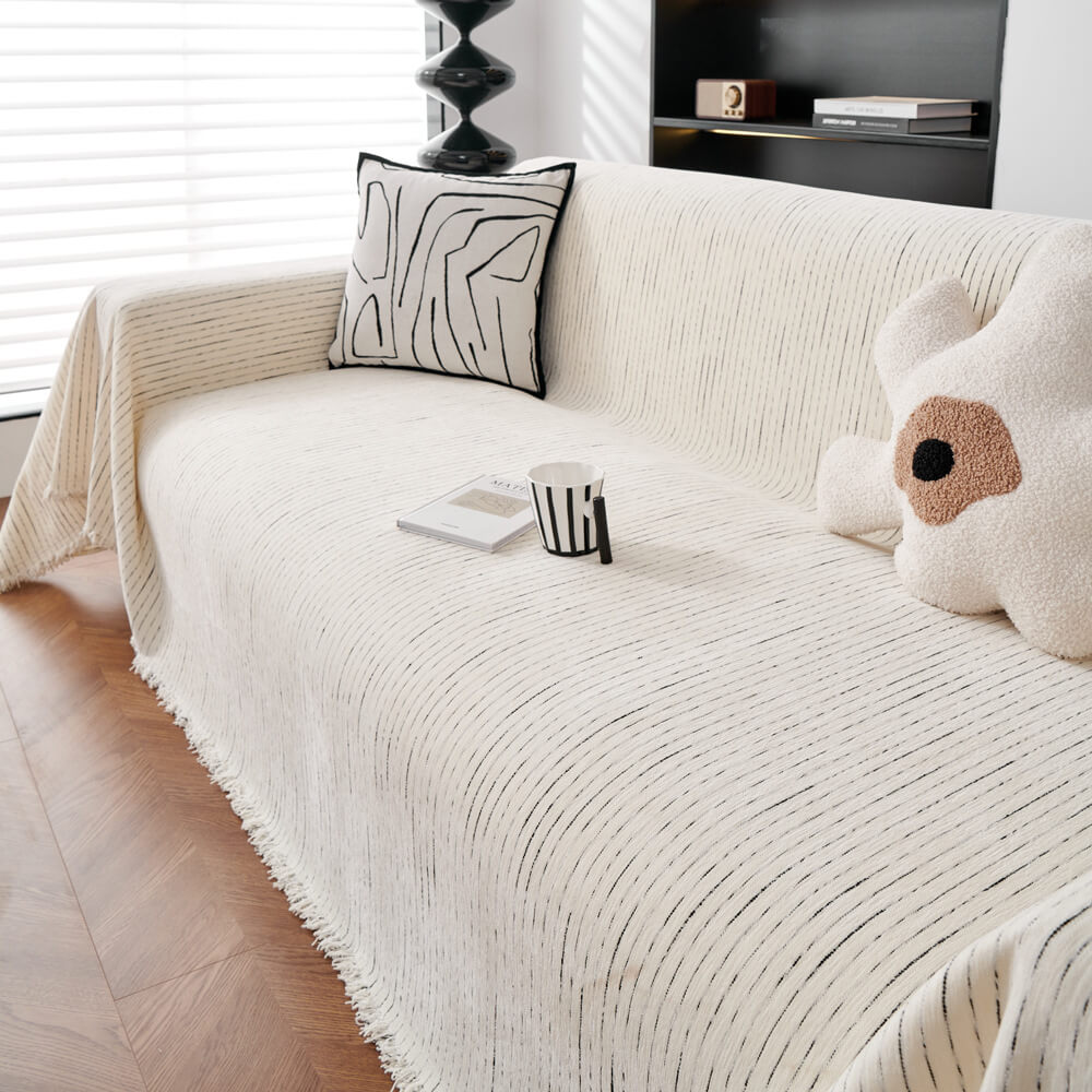 Soft chenille sofa cover on a spacious living room sofa, showcasing durability and comfort
