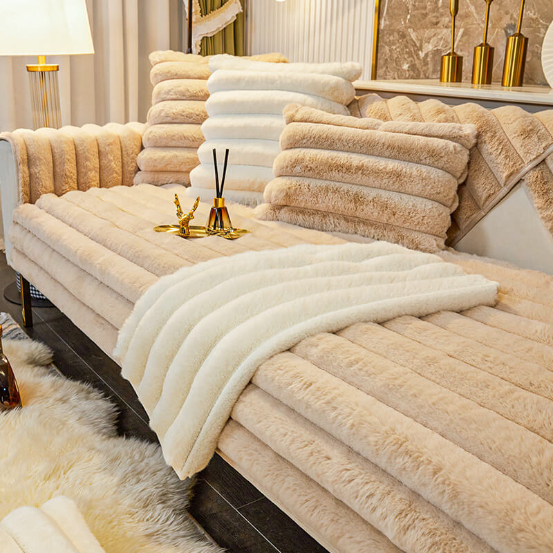 Plush non-slip couch cover with striped design on a modern sofa