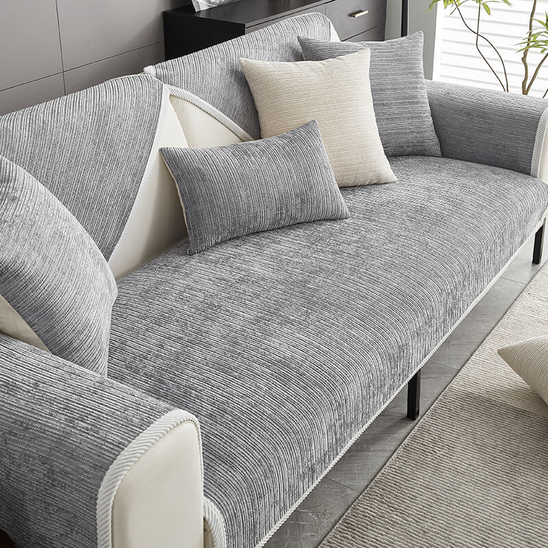Close-up of waterproof chenille sofa cover with anti-scratch fabric protecting furniture from pet scratches