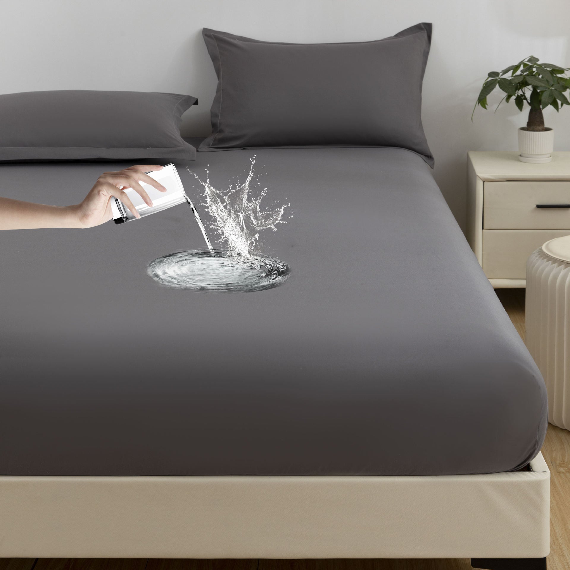 DreamShield Waterproof Fitted Sheet on a queen-sized bed, showing its soft brushed microfiber surface.