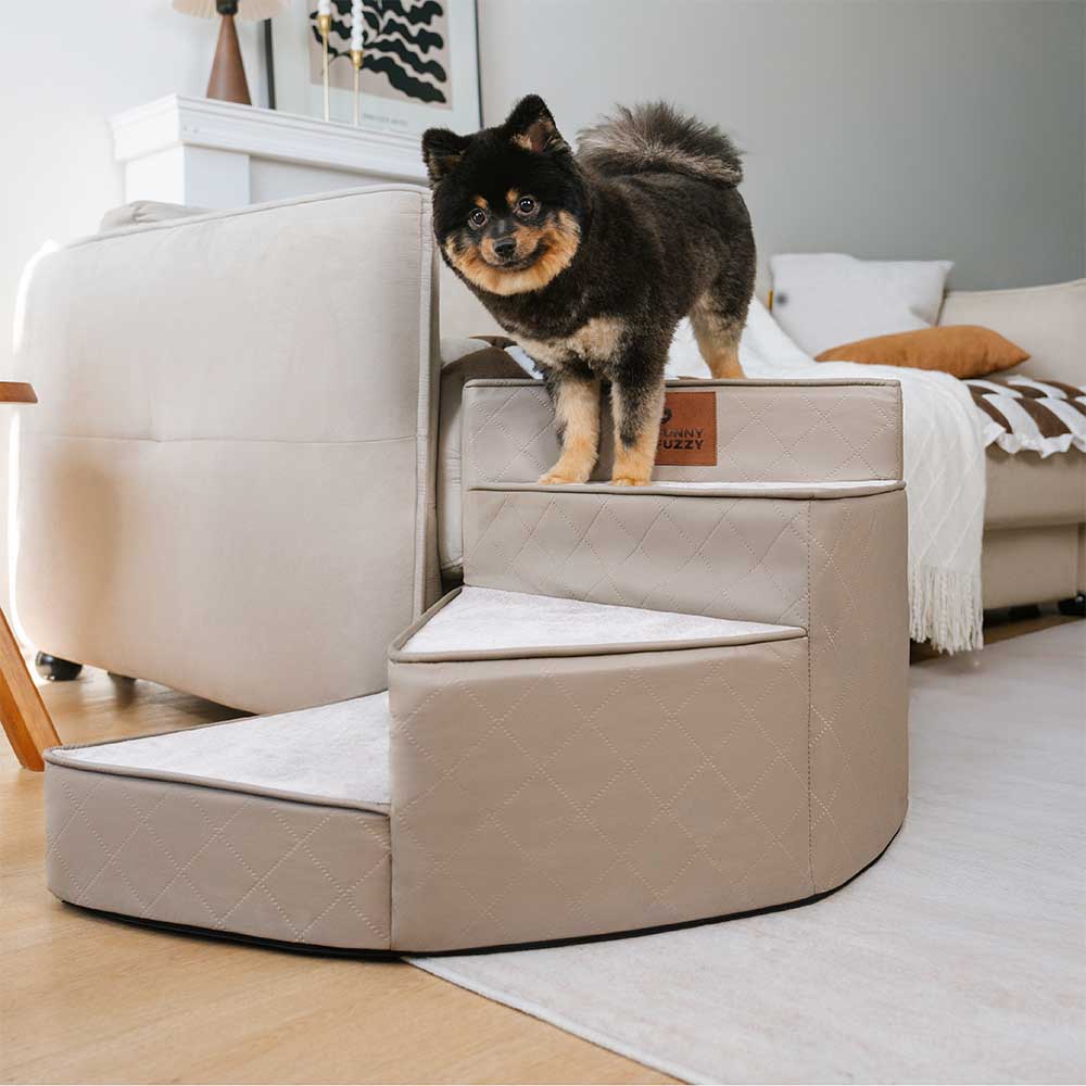 Spiral pet stairs for small dogs beside a sofa, showing compact design