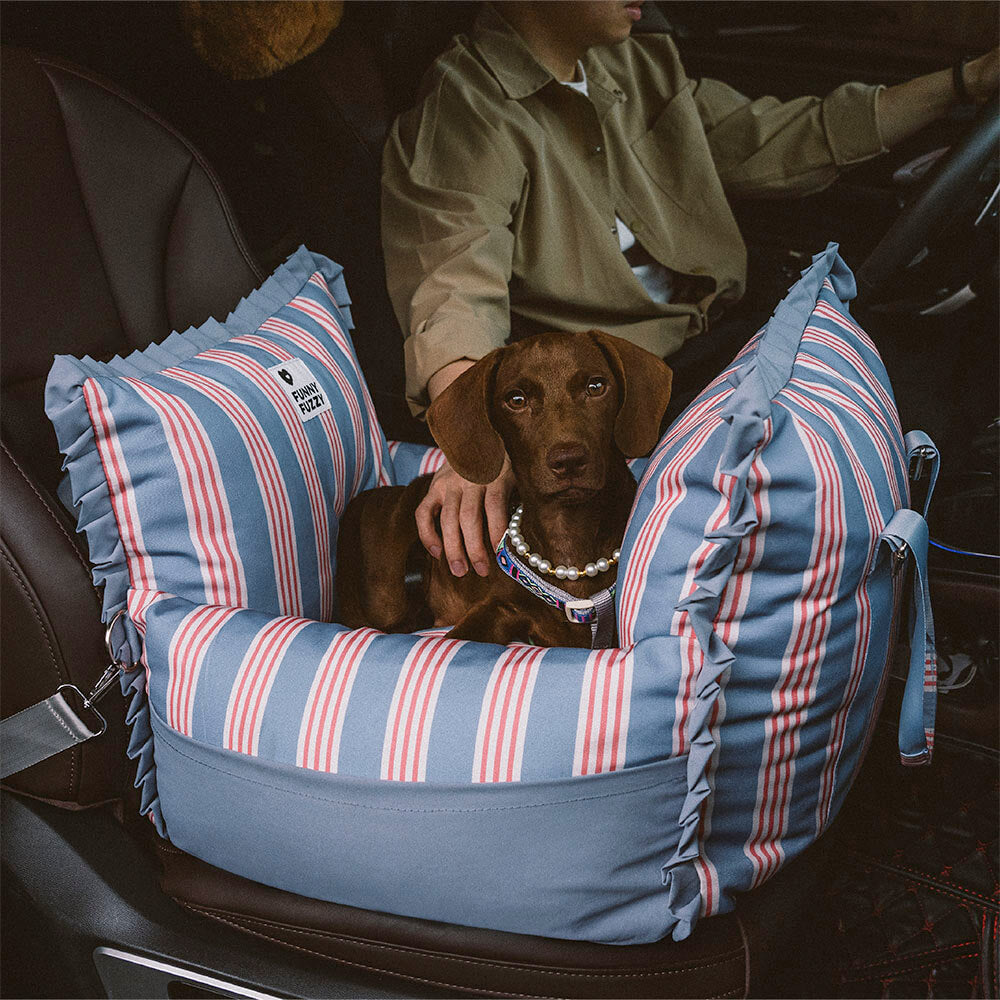 Waterproof dog car seat booster attached to car seat, showing secure straps and fabric material