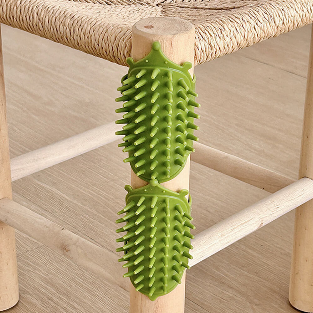 PetSelf Pro Rubber Table Leg Brush attached to a wooden table