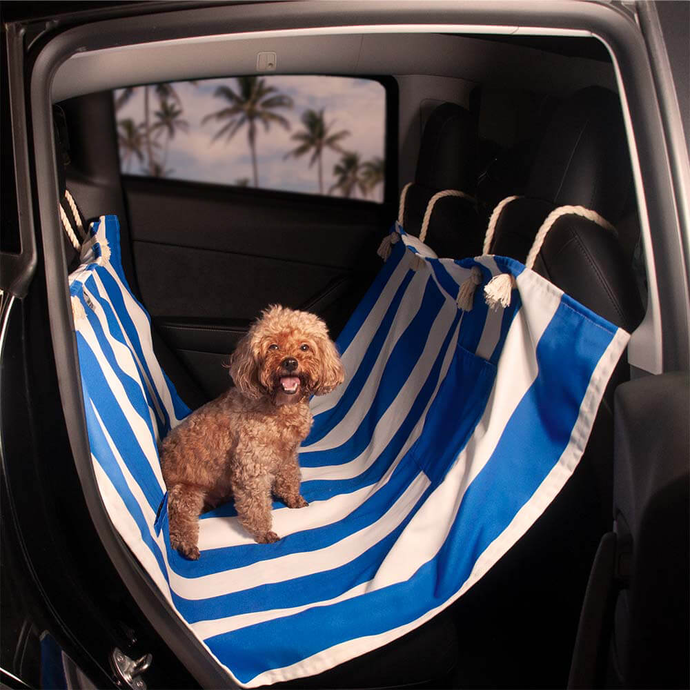 PetGuard Deluxe dog car seat cover installed in an SUV for holiday travel.