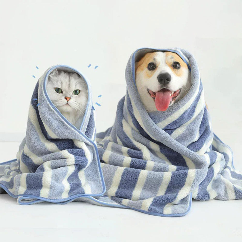 Close-up of plush striped microfiber towel folded on bathroom counter – ideal pet towel for dogs and cats.