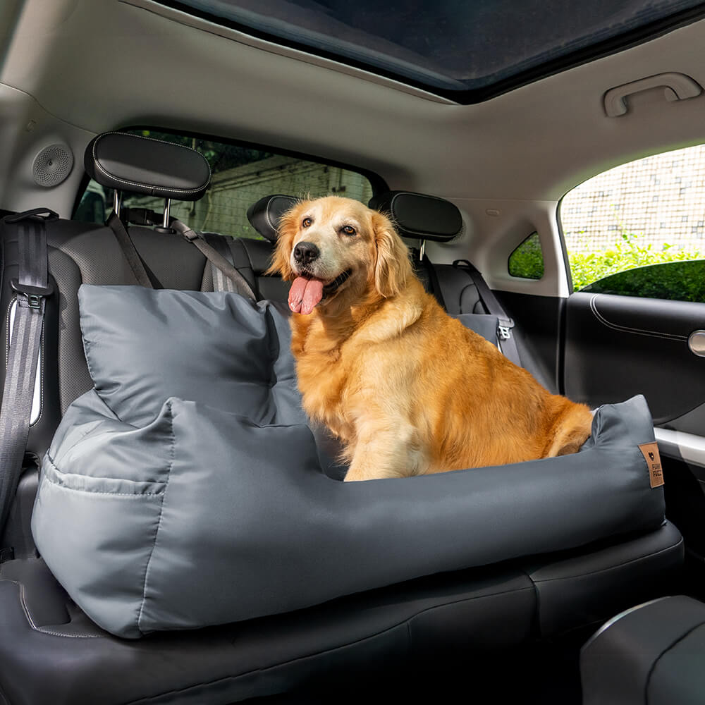 Comfortable waterproof dog car bed in a spacious vehicle, accommodating multiple dogs.
