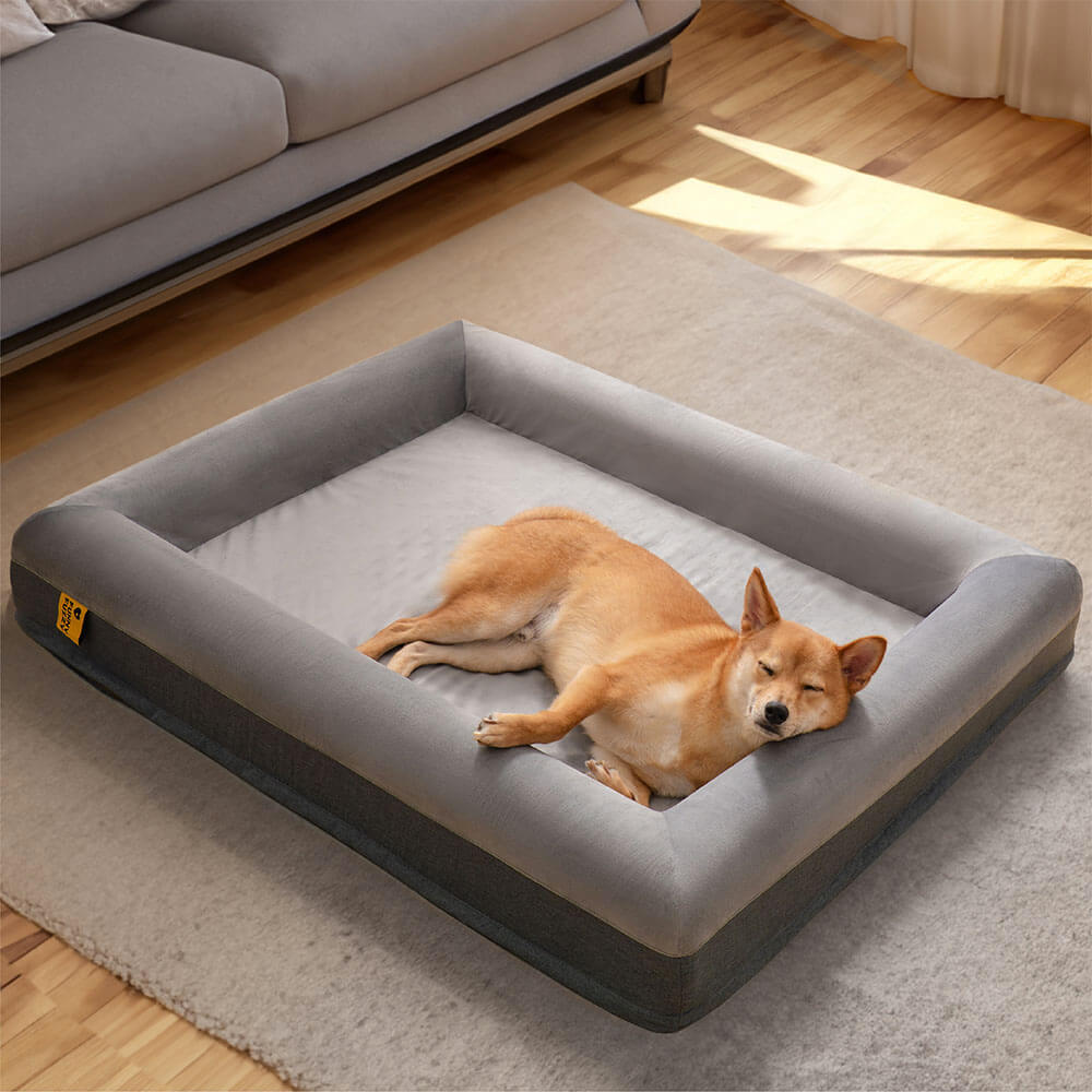 Top view of the orthopedic dog bed with plush velvet and round bolster edges.