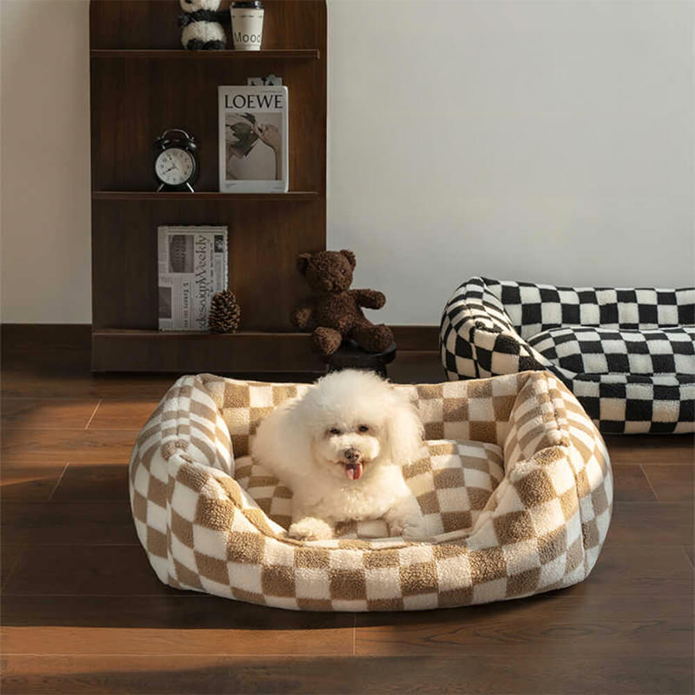 Checkerboard dog sofa bed in cream and gray, shown in a modern living room