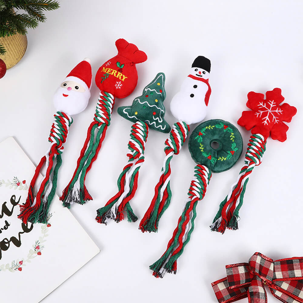 Festive plush dog toy for tugging play with a Christmas design.