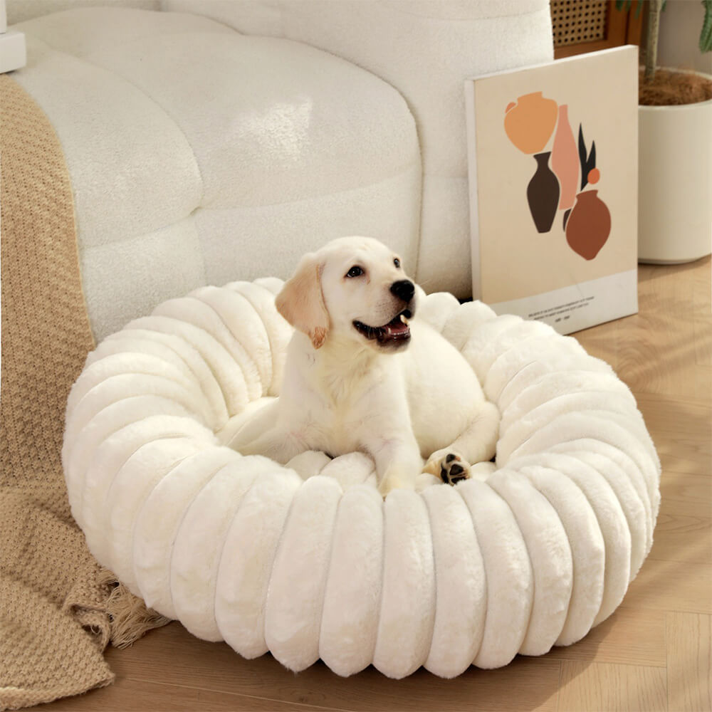 Close-up of plush round donut bed with soft fabric and supportive padding