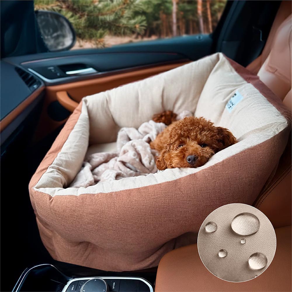 Angled view of dog car seat bed showing elevated cushion and safety tether