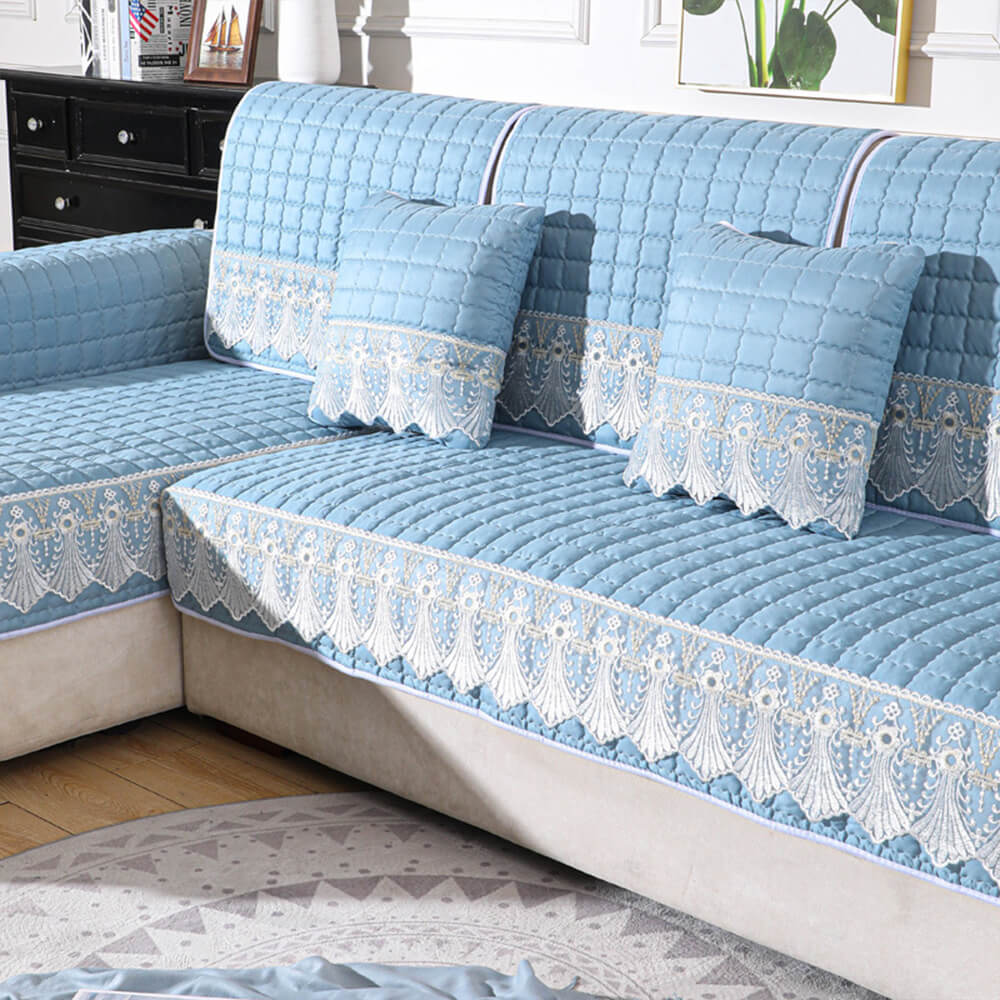 Luxury quilted lace sofa cover in a modern living room