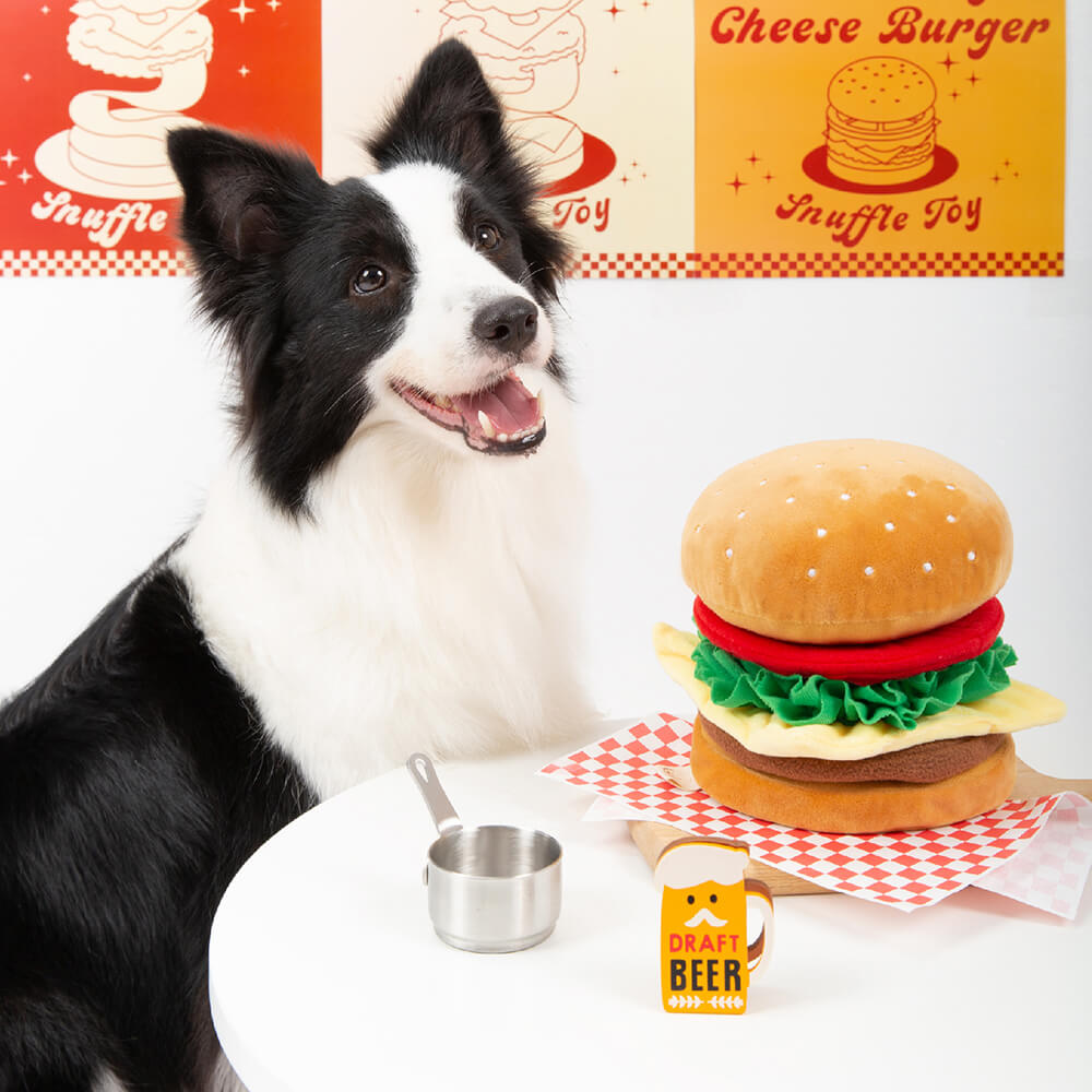 Front view of the Big Bark Mac plush dog toy showing layered textures and squeaky bun.