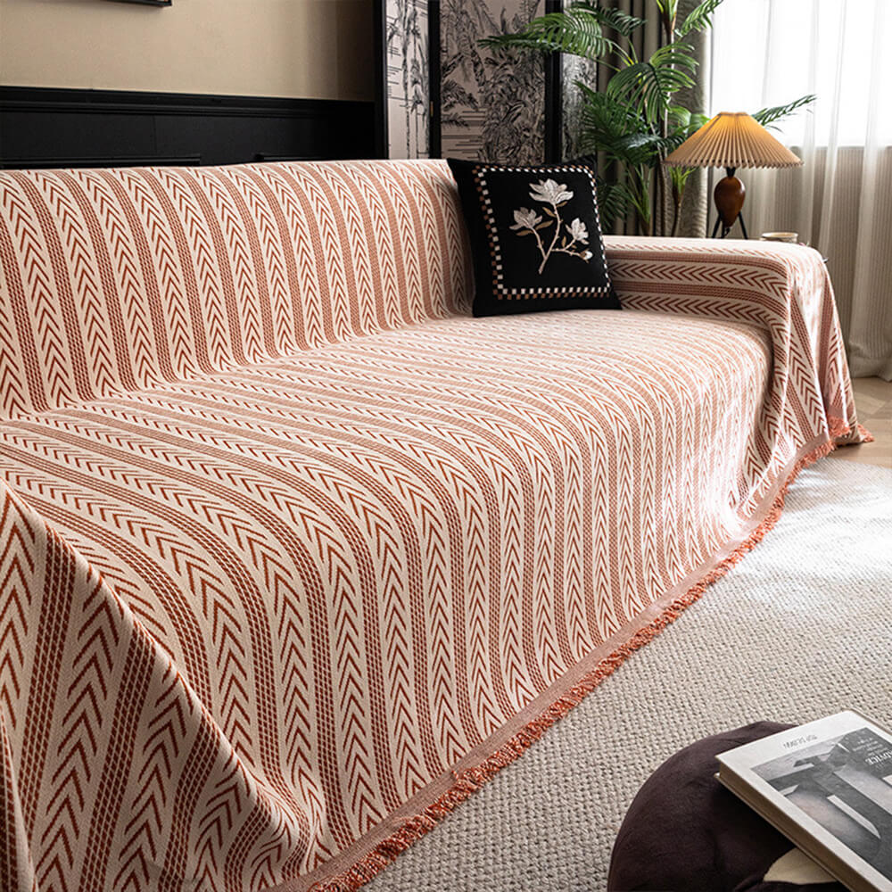 Luxury jacquard chenille sofa cover draped elegantly over a modern sectional sofa