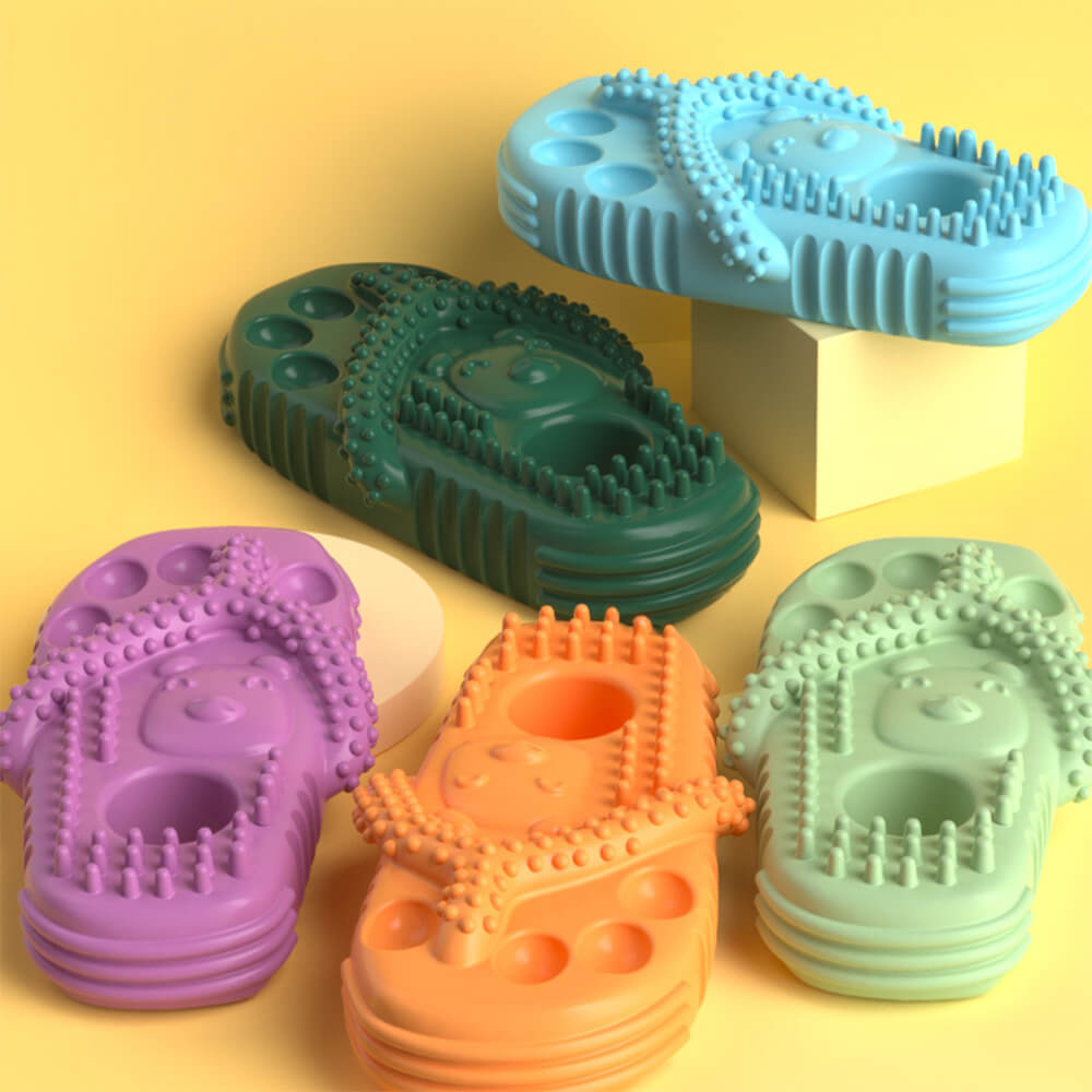 Close-up of slipper-shaped dog chew toy showing textured surface for teeth cleaning.