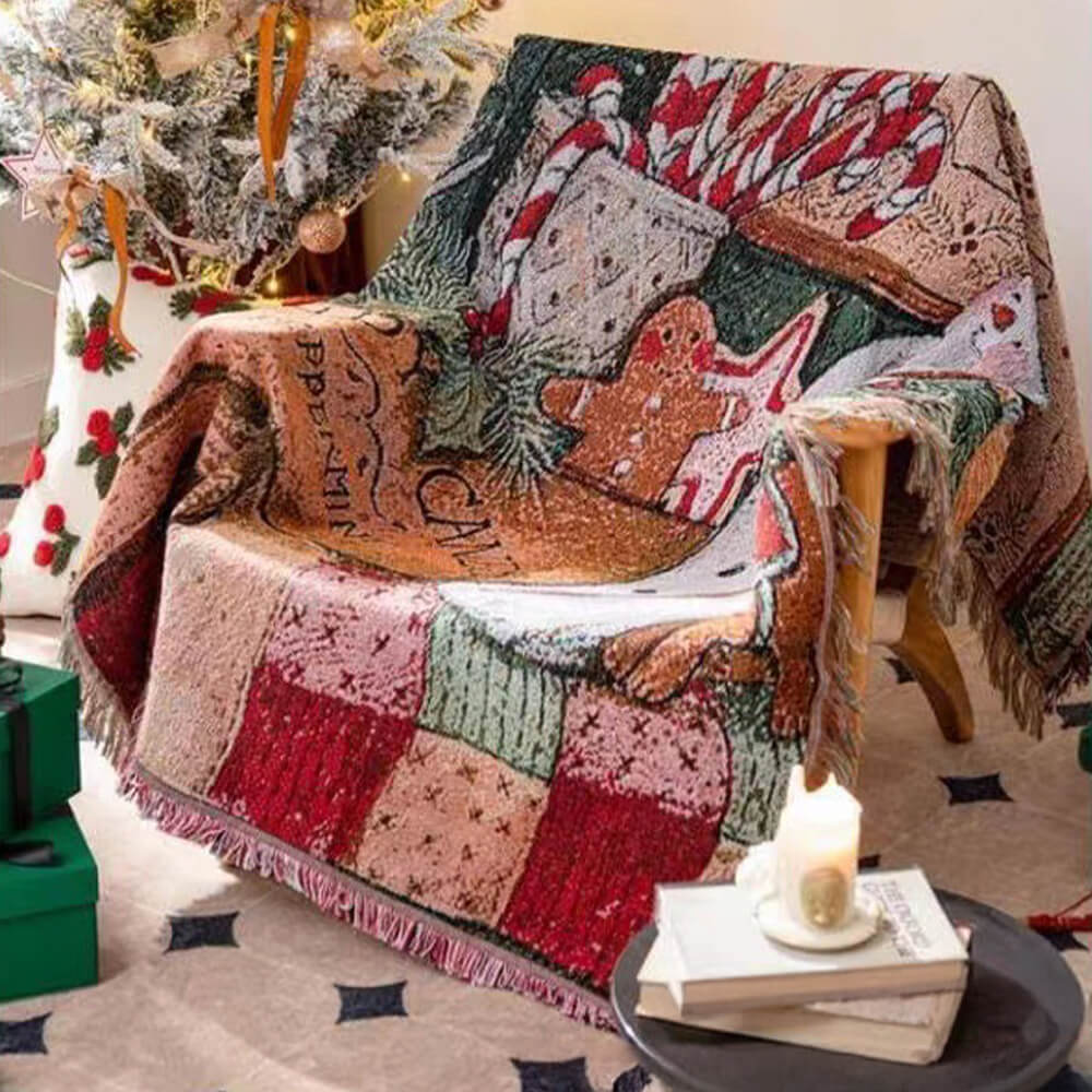 Folded Christmas throw blanket showcasing jacquard texture and fringe hem