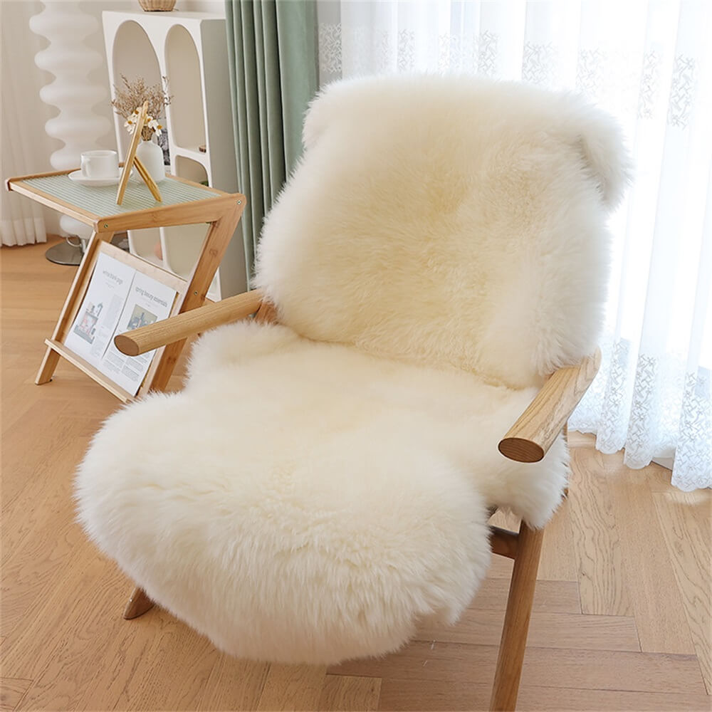 CozyPaws Faux Fur Sofa Cover on a living room sofa, showcasing its soft and cozy texture