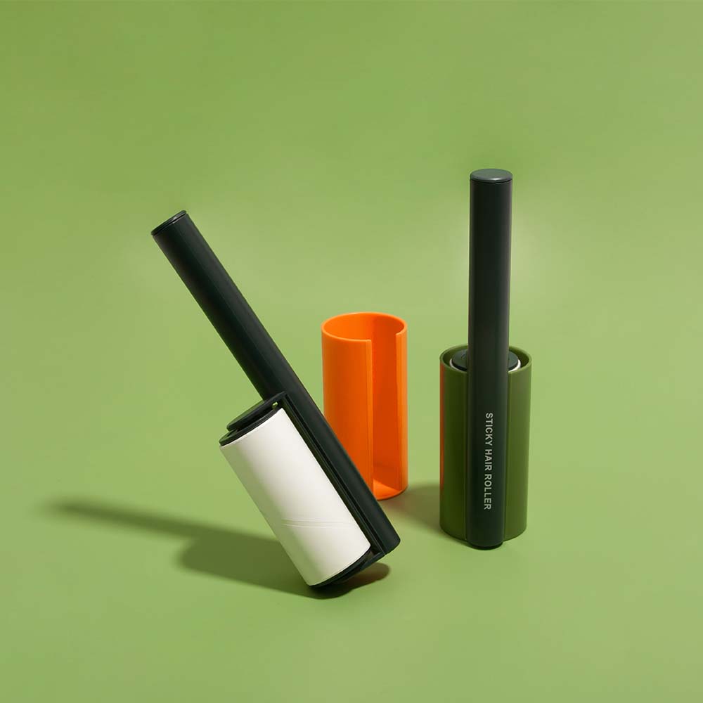 Top view of SwiftSweep sticky roller showing full-wrap housing and ergonomic grip