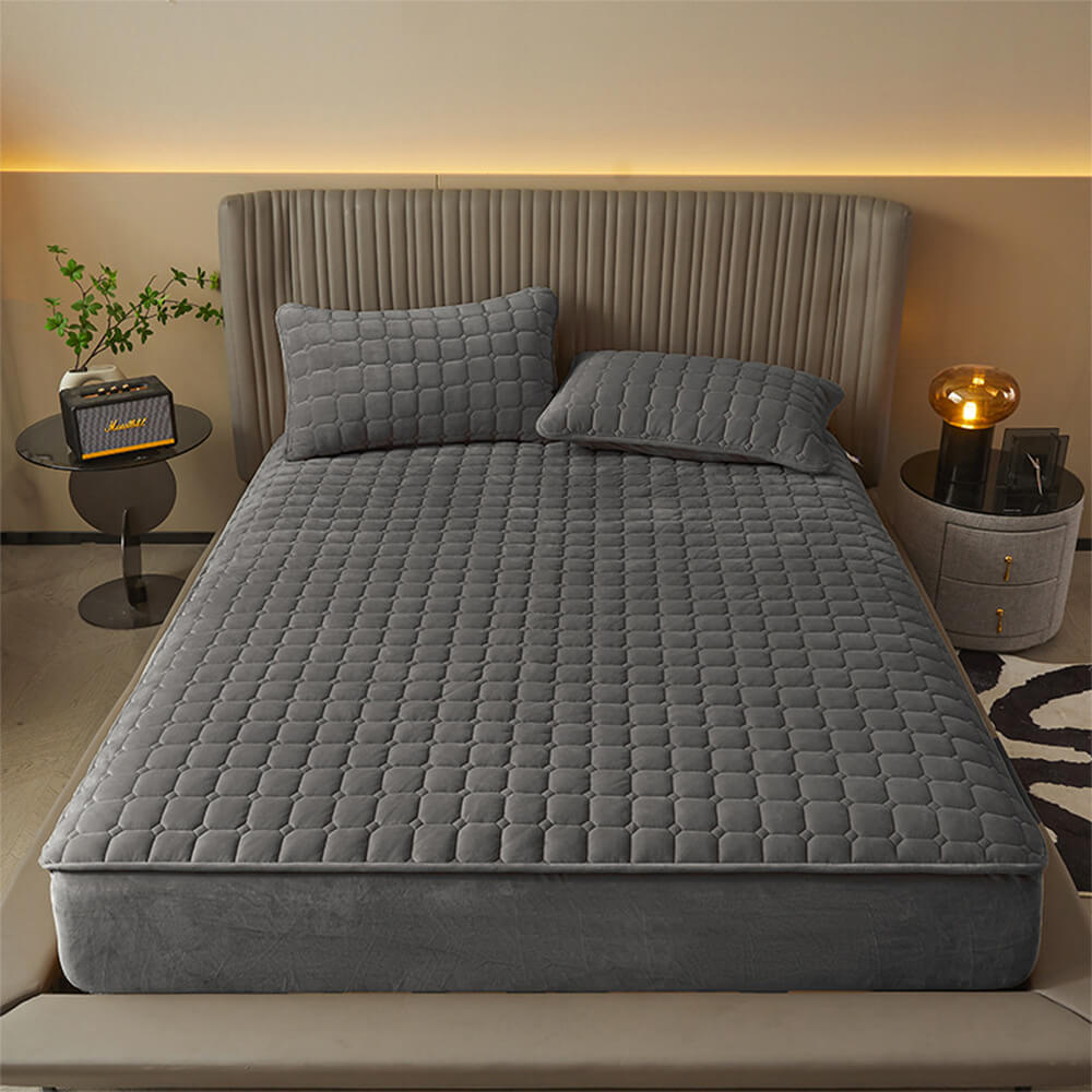 Cozy velvet mattress cover on a bed, showcasing its plush texture and fit.
