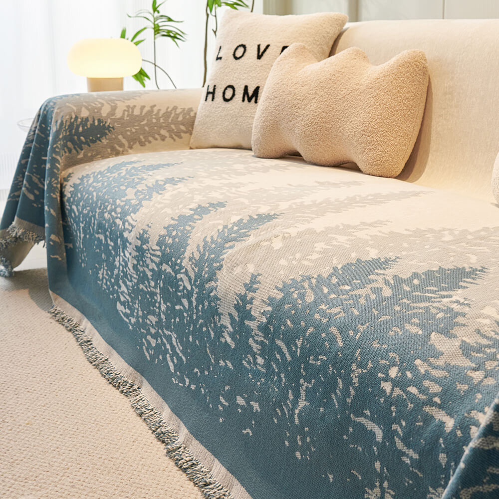 Front angle of chenille sofa cover in warm beige, styled with neutral pillows.