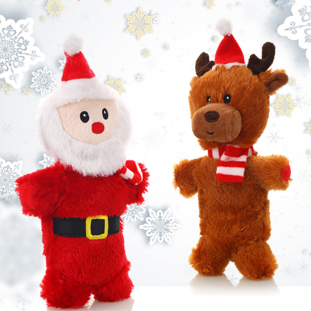 A happy golden retriever playfully holding the Holiday Paws Santa's Buddy interactive plush dog toy in its mouth, showing the toy's soft texture and festive design.