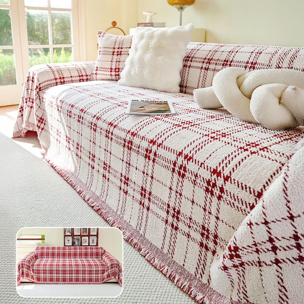 Front view of anti-scratch couch cover styled on a sofa with plush plaid pattern