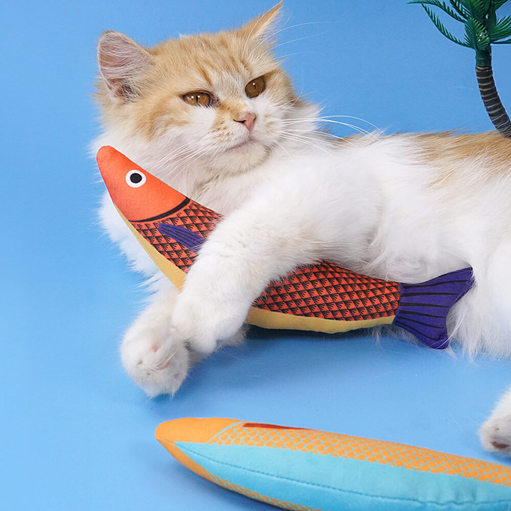 Close-up of Kickfin ColorBurst plush fish toy showing vibrant patterns and soft texture
