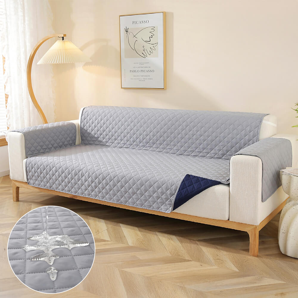 Overhead view of water-resistant couch cover with diamond stitching on beige 3-seater sofa