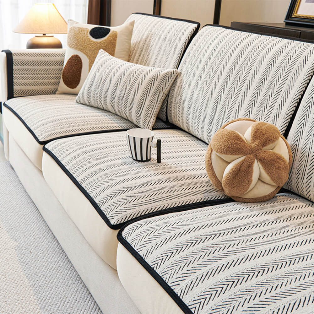 Chenille couch cover with elegant design on a retro-style sofa
