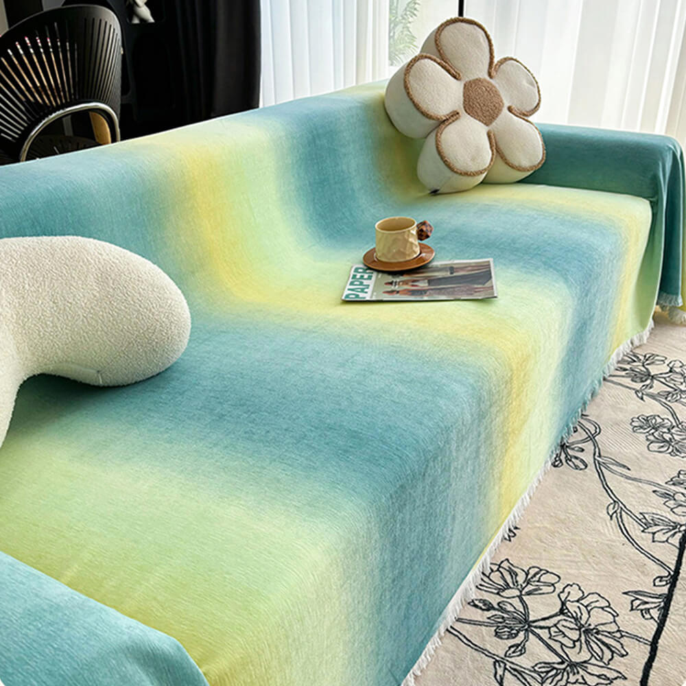 Gradient Chenille Sofa Cover with Waterproof Fabric and Tassels on a modern living room sofa