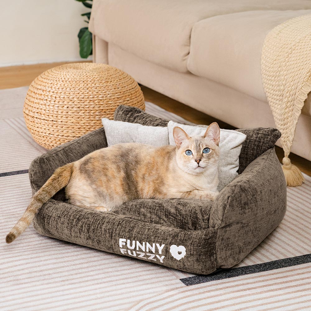 Close-up of plush cushions on vintage washable cat sofa bed