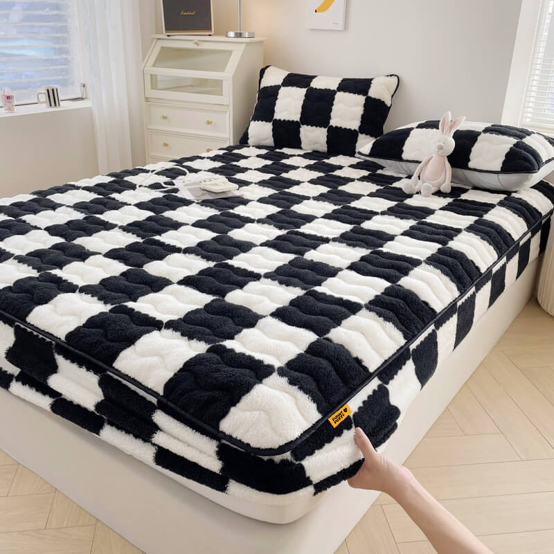 Milk velvet checkered fitted sheet showcasing its plush texture and stylish pattern