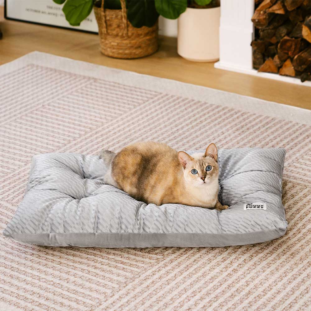 Close-up of plush side of reversible calming cat bed